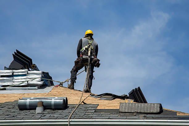 Professional Storm Damage Roof Repair technician working in Lewiston, ME